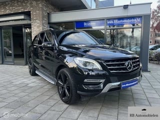 Hoofdafbeelding Mercedes-Benz M-Klasse Mercedes M-klasse 350 BlueTEC|4MATIC|PANO|TREKHAAK|190.688KM