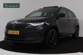 Skoda Karoq 1.5 TSI ACT Sportline Business Automaat (PANORAMADAK, VIRTUAL, TREKHAAK, CAMERA, PDC, NAVI, NL-AUTO, GOED ONDERHOUD)