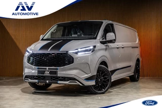 Ford E-Transit Custom 340 L2H1 Sport 65 kWh | 350 KM Range | 360 Camera | Driving Assistant | L+R Schuifdeur | DSS LED | Middenconsole | Navigatie | CarPlay | ACC | Blind Spot | Stuur- en stoelverwarming | Trekhaak | Dakdragers | E-Transit Custom | Zero Emissie 