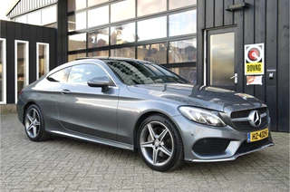 Hoofdafbeelding Mercedes-Benz C-Klasse Mercedes-Benz C-Klasse Coupé 180 Ambition AMG Automaat | Dealer Onderhouden | NL-Auto | Pano | Camera | Cruise