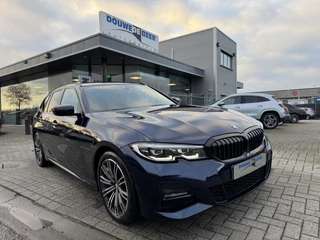 BMW 3 Serie Touring 320i M sport Stoelverw. | LED | HiFi | Tansaniet-Blauw | DAB |