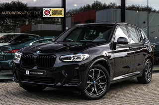 Hoofdafbeelding BMW X3 BMW X3 XDrive30e M-SPORT - TREKHAAK - PANO - SFEERVERLICHTING - DAB+ - SHADOW LINE - 30e - PLUG-IN HYBRIDE