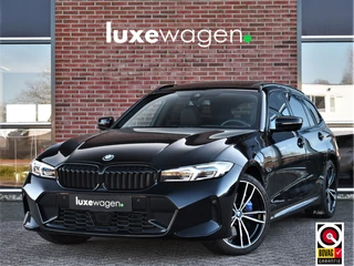 Hoofdafbeelding BMW 3 Serie BMW 3 Serie Touring 330e M-Sport Pano Trekh ACC El-zetel HUD Carbon 19inch Adp-onderstel