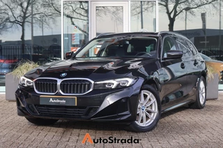 BMW 3-Serie Touring (g21) 320e 204pk | Curve Display | Trekhaak | Camera | Memory | Cruise | Climate | Keyless
