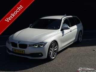 Hoofdafbeelding BMW 3 Serie BMW 3-serie Touring 320d EDE, HARMAN KARDON, Camera, Leder,