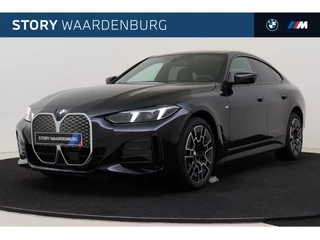 BMW i4 eDrive35 M Sport / Trekhaak / Achteruitrijcamera / Comfort Access / Stuurverwarming / Stoelverwarming / Widescreen Display