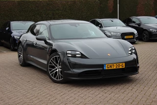 Hoofdafbeelding Porsche Taycan Porsche Taycan Sport Turismo 93 kWh / SoH 93,3% / Panoramadak / Camera / Bose / 20'' / Luchtvering / Leder / Warmtepomp / Dodehoek / Stoelverwarming / DAB / Cruise Control