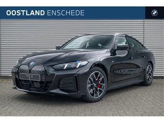 Hoofdafbeelding BMW i4 BMW i4 eDrive40 High Executive M Sport / Adaptieve LED / Parking Assistant Plus / Stuurverwarming / Live Cockpit Professional / Leder / Harman Kardon