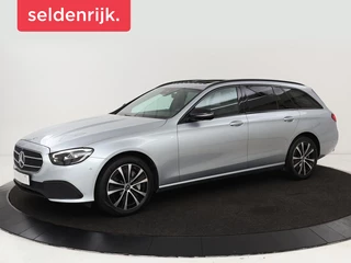 Hoofdafbeelding Mercedes-Benz E-Klasse Mercedes-Benz E-klasse 300de Avantgarde | Schuifdak | Stoelverwarming |  Carplay | Sfeerverlichting | Trekhaak | 360 camera | Navigatie | Full LED