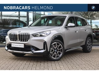 Hoofdafbeelding BMW X1 BMW X1 xDrive23i High Executive xLine Automaat / Panoramadak / Trekhaak / Sportstoelen / Parking Assistant Plus / Comfort Access / Head-Up / Live Cockpit Professional