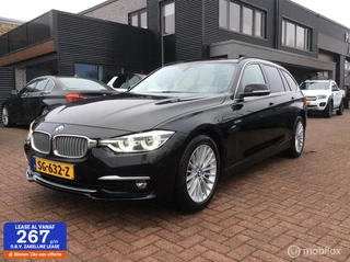 BMW 3-serie Touring 318i Luxury Edition Nav St Verw Trekh Nap