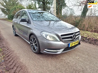 Hoofdafbeelding Mercedes-Benz B-Klasse Mercedes-Benz B-klasse 250 Prestige / panoramadak / trekhaak / standkachel / stoelverwarming / grijs