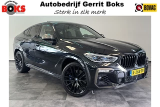 Hoofdafbeelding BMW X6 BMW X6 M50i High Executive Panorama  Head up Navigatie Full opties 530 PK V8  Harman Kardon