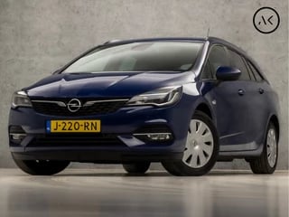 Opel Astra Sports Tourer 1.2 Luxury (APPLE CARPLAY, NAVIGATIE, CAMERA, STUUR/STOELVERWARMING, GETINT GLAS, SPORTSTOELEN, PARKEERSENSOREN, TREKHAAK, NIEUWE APK, NIEUWSTAAT)