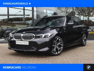 BMW 3 Serie Touring 320i M Sport Automaat / Panoramadak / Trekhaak / Sportstoelen / M Sportonderstel / Achteruitrijcamera / Widescreen Display / Stoelverwarming