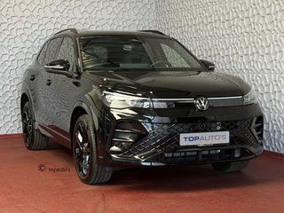 Volkswagen Tiguan 1.5 eHYBRID 272 PK NW AUTO R-LINE VW.TREKHAAK BLACK PANO XL.NAVI STOEL/STUUR VERW. BLACK.STYLE 360.CAM ELEK.KLEP MATRIX.LED 20''LMV MASSAGE SCHUIFDAK PHEV PLUG IN HYBRID ✅Top Auto's Wijchen , 30 Jaar Specialist in Volkswagen  : Alle Type's : R-Line Edition / Style / First Edition / Highline / Life , Zowel PHEV / HEV / MHEV / Benzine ✅