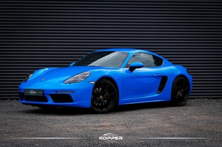 Hoofdafbeelding Porsche 718 Porsche 718 Cayman 2.0 / Sportuitlaat / Sportchrono / 20'' / Wrap (Origineel Lava Oranje)