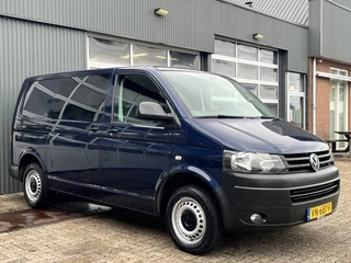 Volkswagen Transporter 2.0 TDI L1H1 BTW VRIJ!! Airco Cruise control Parkeersensoren voor en achter Telefoonvoorbereiding Navigatie 1e eigenaar Dealer onderhouden Euro 5 Ex overheid