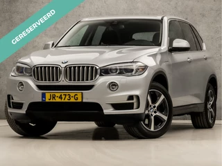 BMW X5 xDrive40e High Executive 313Pk Automaat (GROOT NAVI, HEAD-UP DISPLAY, 360 CAMERA, SFEERVERLICHTING, LEDER, TREKHAAK, SPORTSTOELEN, GETINT GLAS, ELEK ACHTERKLEP, NIEUWE APK, NIEUWSTAAT)