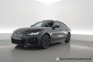 BMW i4 eDrive40 M Sport Pro 84 kWh | S/K-Dak | Elek. Trekhaak | Shadowline | Widescreen | Adapt. Cruise | Camera+PDC | Memory | Stoel-Stuurverw. | Nav+App.Connect V