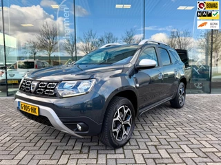 Hoofdafbeelding Dacia Duster Dacia Duster 1.3 TCe 130pk Prestige, NAP, CarPlay, Camera, PDC