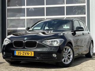BMW 1 Serie 114i EDE Business+ 100pk | Bi-xenon koplampen | Bluetooth | Cruise control | Lederen bekleding | Navigatiesysteem full map | Parkeersensor achter | Voorstoelen verwarmd | Zeer nette auto!