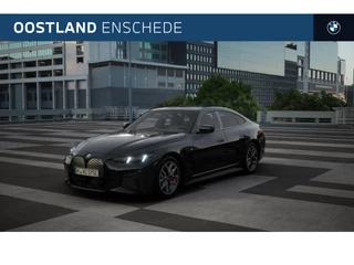 Hoofdafbeelding BMW i4 BMW i4 eDrive40 High Executive M Sport / Adaptieve LED / Parking Assistant Plus / Stuurverwarming / Live Cockpit Professional / Leder / Harman Kardon