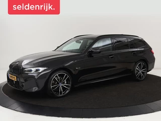BMW 3-serie 320e M Sport | Head-Up | Adaptive cruise |  Trekhaak | Leder | Stoelverwarming | Camera | Keyless | Adaptief LED | Carplay | Sfeerverlichting | Navigatie