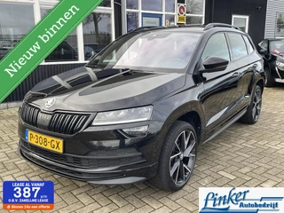 Skoda Karoq 1.5 TSI ACT Sportline Business -PANO TREKHAAK NL-AUTO CAMERA PDC