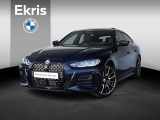 Hoofdafbeelding BMW 4 Serie BMW 4 Serie Gran Coupé | M440i | High Executive | M Sportpakket | Glazen schuif-/kanteldak | 20 inch | Driving Assistent Professional | Trekhaak | Harman Kardon | Head Up Display