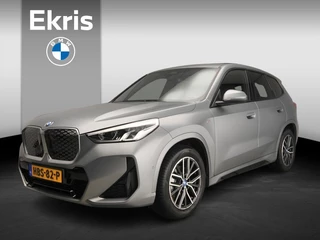 Hoofdafbeelding BMW iX1 BMW iX1 eDrive20 | M-Sportpakket | LED | Navigatie | Schuifdak | Trekhaak | Elektr. zetels | DAB | Harman-kardon sound | Alu 18 inch
