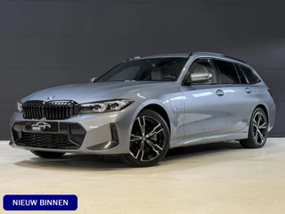 BMW 3 Serie Touring 330e | M-pakket | Facelift | Lederen sportstoelen | Harman/Kardon | Sfeerverlichting | Full LED
