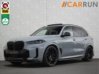BMW X5 50e M-Sport Pro | M-Performance Stoelen | Achterasbesturing | Carbon | ACC | Panorama | 360 Camera | Soft-Close | Head-Up | M-Gordels | Trekhaak | Harman-Kardon | 22 inch | Individual Leder | Stoelventilatie | Stoelverwarming V+A | Keyless-Entry | Memory | Stuurverwarming | Iconic-Glow | Rij-Assist Pro | Beker Koeling & Verwarming | Zonwering |