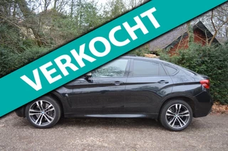 BMW X6 M50d schuifdak/half-leer