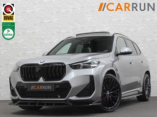BMW X1 18i M-Sport Performance-Pack | Panorama | Sportstoelen | Carbon | Keyless-Entry | Sfeerverlichting | Achteruitrij-Camera | 5x op voorraad | Carplay | Full-LED | Black-Optic | Getint Glas | Stoelverwarming | Draadloos Laden |
