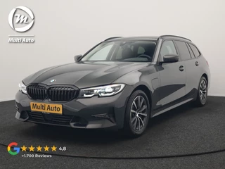 BMW 3 Serie Touring 330e Sport Line PHEV 293pk Dealer O.H. DRAVITGRAU | Trekhaak Af Fabriek | Adaptive Cruise | 360 Camera | Lederen Sportstoelen Memory & Verwarmd | Sfeerverlichting | Stuur Verwarmd | Apple Carplay | Navigatie | DAB | Plug In Hybrid |