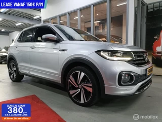 Hoofdafbeelding Volkswagen T-Cross Volkswagen T-Cross 1.5 TSI DSG  3X R LINE VIRTUAL CRUISE CLIMA NAVI ZEER NETJES
