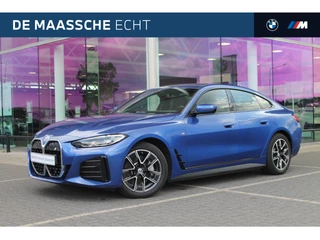 BMW i4 eDrive40 / Schuif-kanteldak / Achteruitrijcamera / Live Cockpit Plus / Parking Assistant / Stoelverwarming