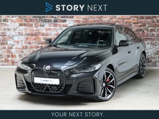 BMW i4 eDrive40 High Executive M Sport Pakket Automaat / Live Cockpit Pro / 19 Inch / Schuif-/kanteldak / Hifi / Shadow Line / DAB / Driving Assistant / Stoelverwarming / Achteruitrijcamera / Extra Getint Glas / Cruise Control/ 19 Inch / Leder / Adaptief Onderstel