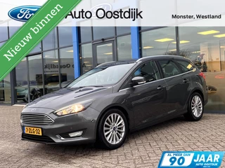 Ford Focus 1.0 Titanium 125PK NIEUWE DISTRIBUTIERIEM!! Voorruitverwarming Climate Cruise Parkeersensoren Navi 17" Velgen *Dealer Onderhouden*