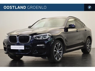 Hoofdafbeelding BMW X4 BMW X4 xDrive30i High Executive M Sport Automaat / Panoramadak / Sportstoelen / Adaptieve LED / Head-Up / Apple CarPlay / Comfort Access / Parking Assistant / Navigatie Professional