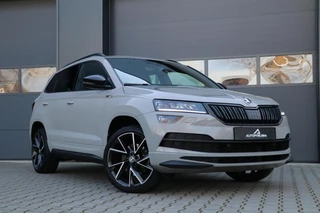 Skoda Karoq 1.5 TSI ACT Sportline Business Canton Sound System Schuif-Kanteldak Lmv Sportzetels AppleCarplay Facelift MatrixLed PrivacyGlass 90000km