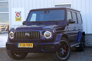 Hoofdafbeelding Mercedes-Benz G-Klasse Mercedes-Benz G-Klasse AMG 63 Grijs kenteken*MB Fabrieksgar.t/m02-2029!*Mystic Blue*Drivers package/Ride Control/Sportuitlaat/Nappa/Massage/ACC/Dak/Night II/22 inch/VOL*