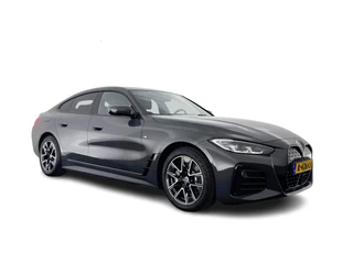BMW i4 eDrive40 84 kWh M-Sportpack [ 3-Fase ] { SOH-95%} (INCL-BTW) *LEATHER-ALCANTARA | FULL-LED | ADAPTIVE-CRUISE | WIDE-SCREEN-DIGI-COCKPIT | DAB+ | CAMERA | AMBIENT-LIGHT | CARPLAY | SPORT-SEATS | PRIVACY-GLASS | TOWBAR | 18''ALU*