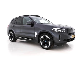 Hoofdafbeelding BMW iX3 BMW iX3 High Executive 80 kWh [ 3-Fase ] (INCL-BTW) *PANO | LUXURY-LEATHER | FULL-LED | DAB | CARPLAY | ADAPTIVE-CRUISE | DIGI-COCKPIT | BLINDSPOT | HARMAN/KARDON-SOUNDSYTEM | HEAD-UP | KEYLESS | TOP-VIEW | SPORT-SEATS | TOWBAR  | .