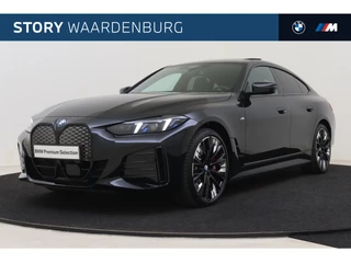 Hoofdafbeelding BMW i4 BMW i4 eDrive40 Gran Coupé High Executive M Sport / Schuif-kanteldak / M Sportstoelen / Adaptieve LED / Parking Assistant Plus / Stoelverwarming / Live Cockpit Professional