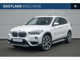 BMW X1 sDrive20i High Executive xLine Automaat / Panoramadak / Trekhaak / Sportstoelen / Achteruitrijcamera / Stuurverwarming / Comfort Access / LED / Head-Up