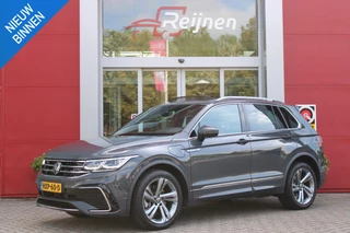 Volkswagen Tiguan 1.4 TSI 245PK eHybrid R-LINE BUSINESS + | PANORAMISCH SCHUIF/KANTEL DAK | ELEKTRISCH WEGKLAPENBARE TREKHAAK | R-LINE INTERIEUR/EXTERIEUR | VERWARMBARE VOORSTOELEN/STUUR | ELEKTRISCH BEDIENBARE VOORSTOELEN MET GEHEUGEN FUNCTIE | AKOESTISCH GLAS GETINT | KEYLESS ACCESS/START | ELEKTRISCH BEDIENABRE ACHTERKLEP | DAKSPOILER R-LINE | SFEER VERLICHTING | RIJASSISTENT PAKKET O.A. LANE ASSIST EN ADAPTIVE CRUISE CONTROL EN DODEHOEK DETECTIE | NAVIGATIE | APPLE CARPLAY/ANDROID AUTO | DAB+ RADIO | LED MATRIX KOPLAMPEN (IQ LIGHT) | DRAADLOZE TELEFOONLADER | DIGITAAL DASHBOARD | 360° CAMERA | CLIMA CONTROL VOOR EN ACHTERIN | BEKLEDING LEDER VIENNA |