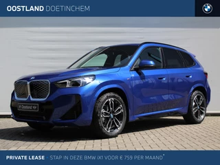 BMW iX1 eDrive20 M Sport / Panoramadak / Trekhaak / Sportstoelen / M Adaptief onderstel / Comfort Access / Parking Assistant / Stuurverwarming
