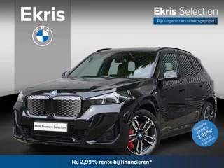 BMW iX1 eDrive20 M Sportpakket Pro | Travel Pack | 19 inch LM M Dubbelspaak (Styling 871 M) | Trekhaak met elektrisch wegklapbare kogel | Glazen panoramadak | Driving Assistant Plus | Ekris Selection